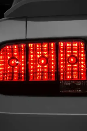 Raxiom 05-09 Ford Mustang Tail Lights- Black Housing (Smoked Lens) Limited Time