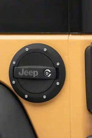 Officially Licensed Jeep 07-18 Jeep Wrangler JK Locking Fuel Door w/ Engraved Jeep Logo Professional Grade