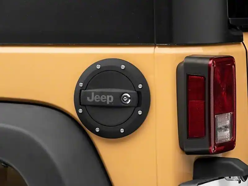 Officially Licensed Jeep 07-18 Jeep Wrangler JK Locking Fuel Door w/ Engraved Jeep Logo Professional Grade