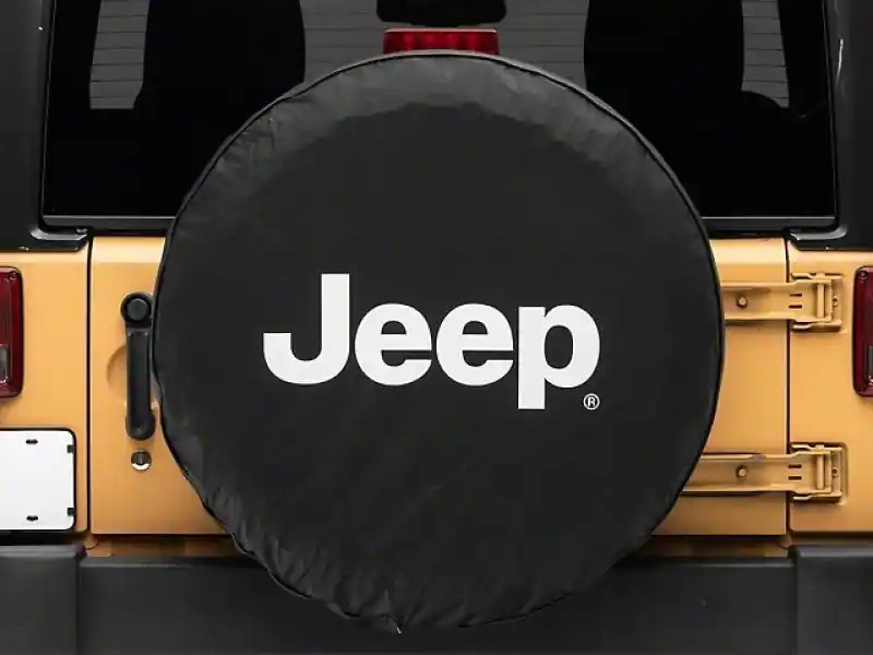 Officially Licensed Jeep 66-18 CJ5/ CJ7/ Wrangler YJ/ TJ/JK White Logo Spare Tire Cover- 33In Brand New